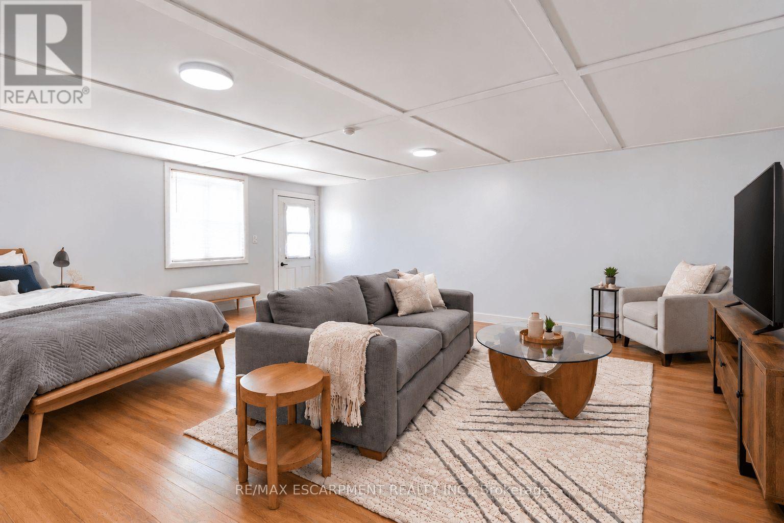 Bachelor Living Space Virtually Staged - 548 Beach Road, Hamilton, ON