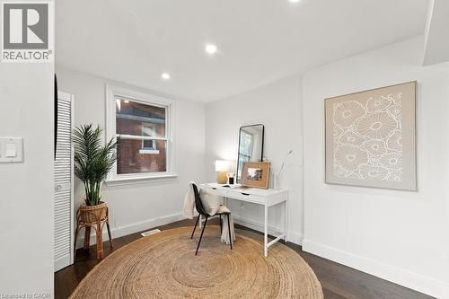 Hardwood flooring, recessed lighting, white trim, and a white-framed window - 284 East 21St Street, Hamilton, ON 
