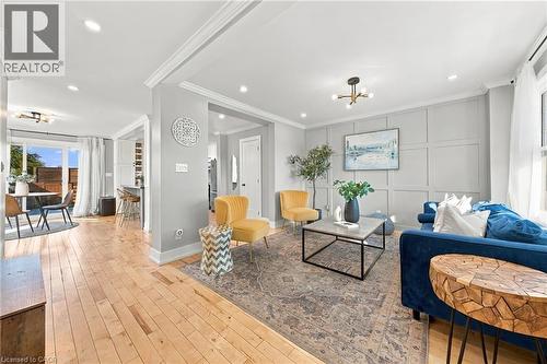 Light wood-finish flooring throughout - 1231 Dunsmure Road, Hamilton, ON 