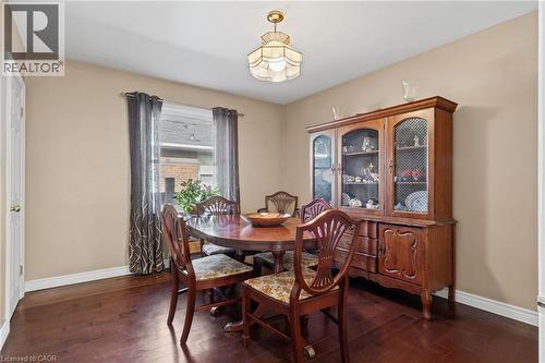 Wood-finish flooring, neutral wall paint, and a built-in ceiling light fixture - 366 East 17Th Street, Hamilton, ON 