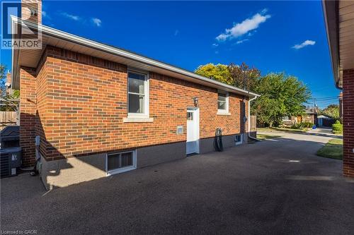 Brick exterior with white trim - 366 East 17Th Street, Hamilton, ON 