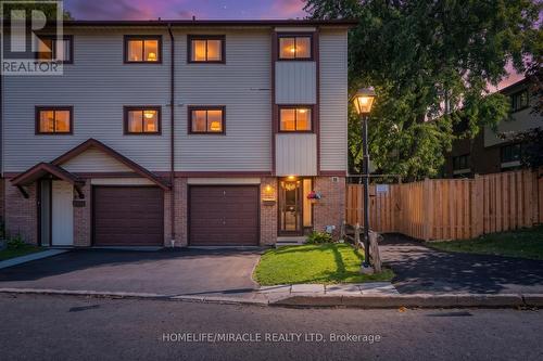 63 MCCALLUM COURT  Brampton, ON L6W 3M4