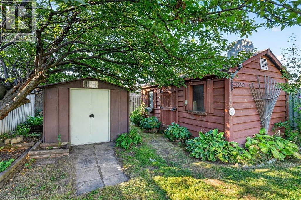 Two detached storage sheds with varied exterior finishes - 215 Paling Avenue, Hamilton, ON