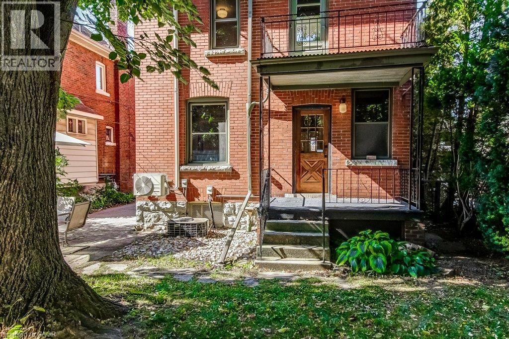 Brick exterior with stone foundation - 43 Rosslyn Avenue S, Hamilton, ON