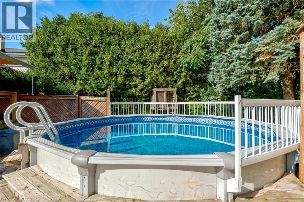 Above-ground pool with integrated entry ladder - 8 Bonnylyn Drive, Kitchener, ON