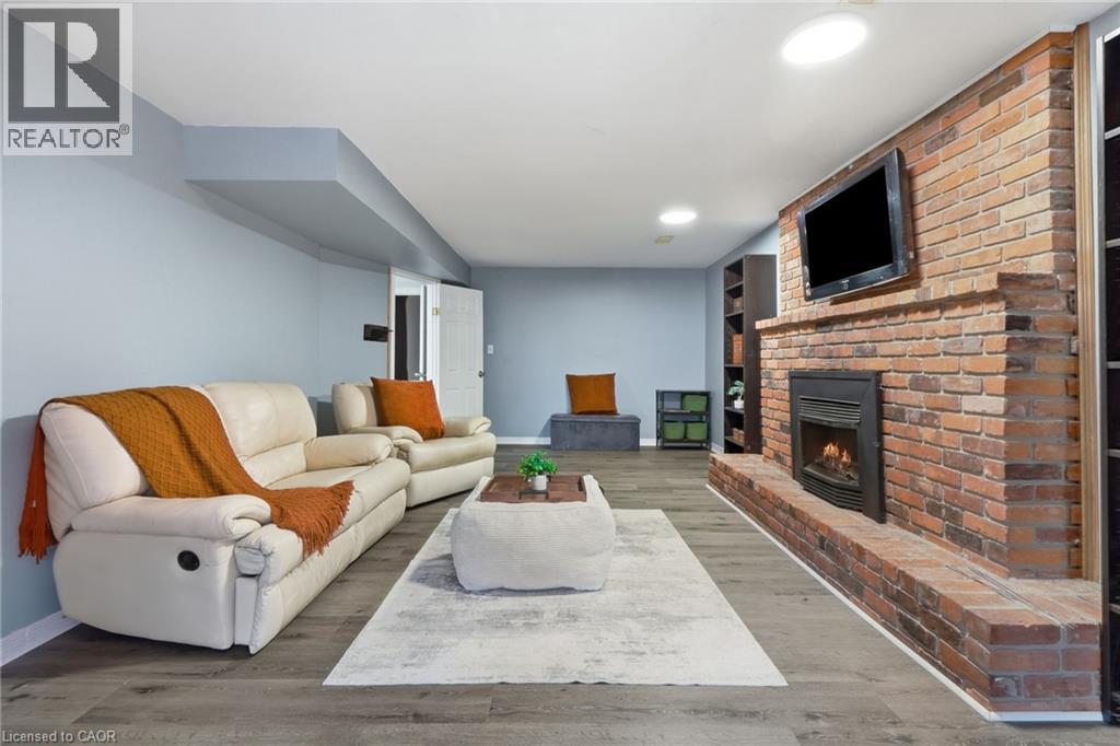 49 Markson Crescent, Hamilton, ON - Indoor Photo Showing Living Room With Fireplace