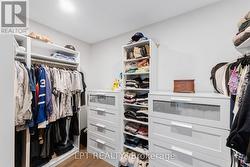 Primary Bedroom Walk in Closet - 