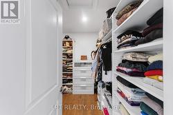 Primary Bedroom Walk in closet - 