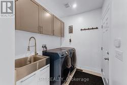 Laundry Room with Entrance from Garage - 