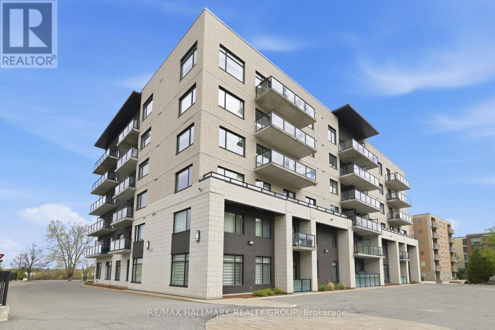 206 - 310 Centrum Boulevard, Ottawa, ON - Outdoor With Balcony With Facade