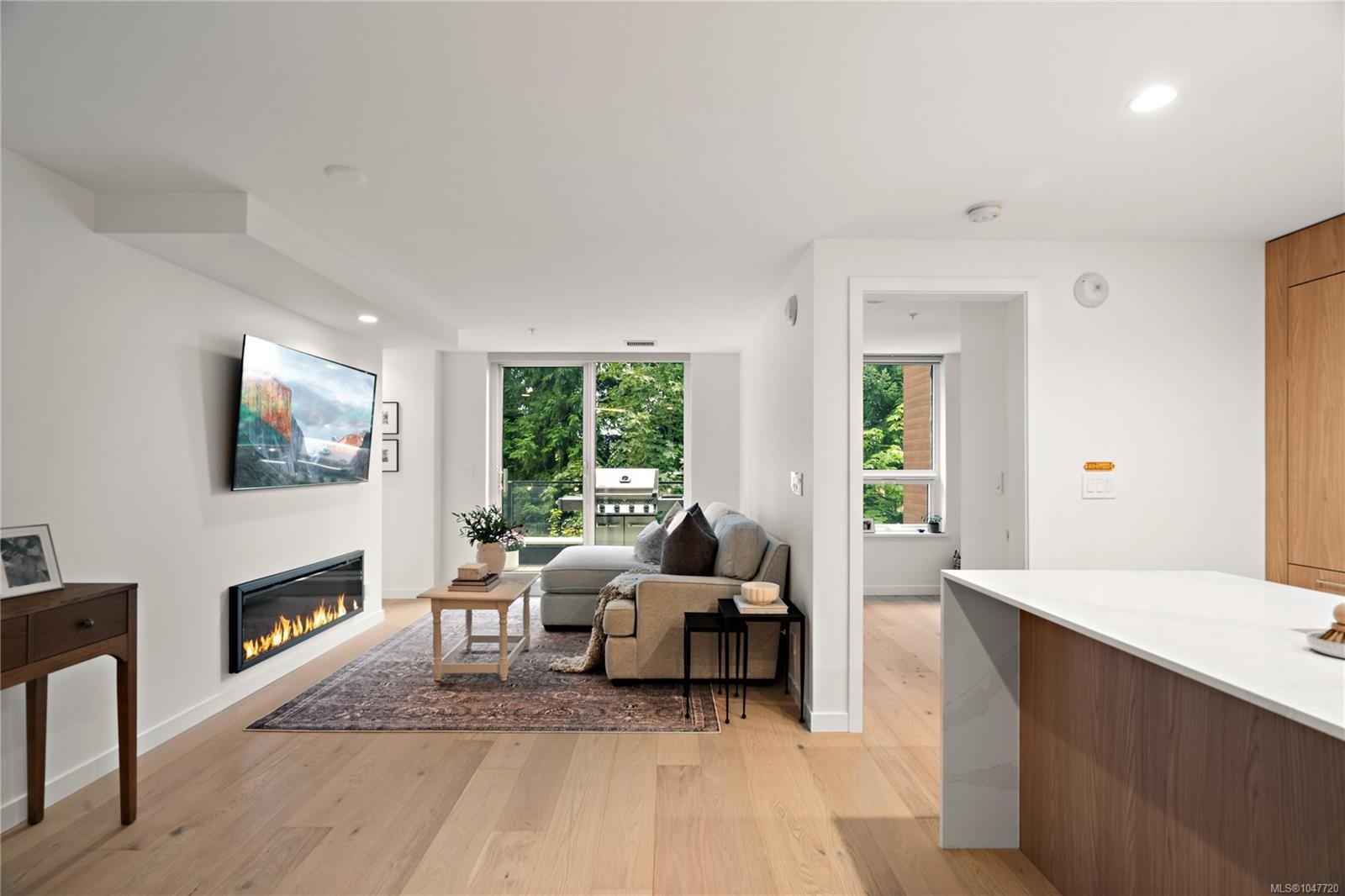 #222-2000 Hannington Rd, Langford, BC - Indoor Photo Showing Living Room With Fireplace