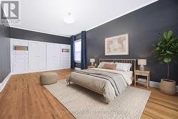 Primary Bedroom with built in closets and drawers - 