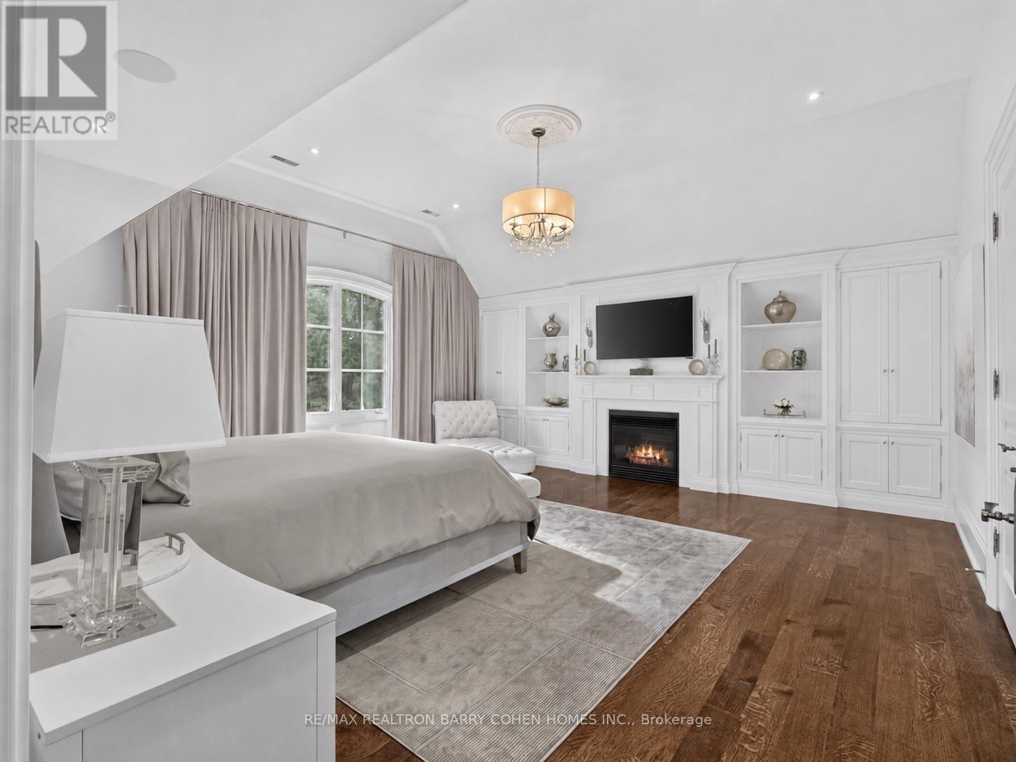 21 Don Ridge Drive, Toronto, ON - Indoor Photo Showing Bedroom With Fireplace