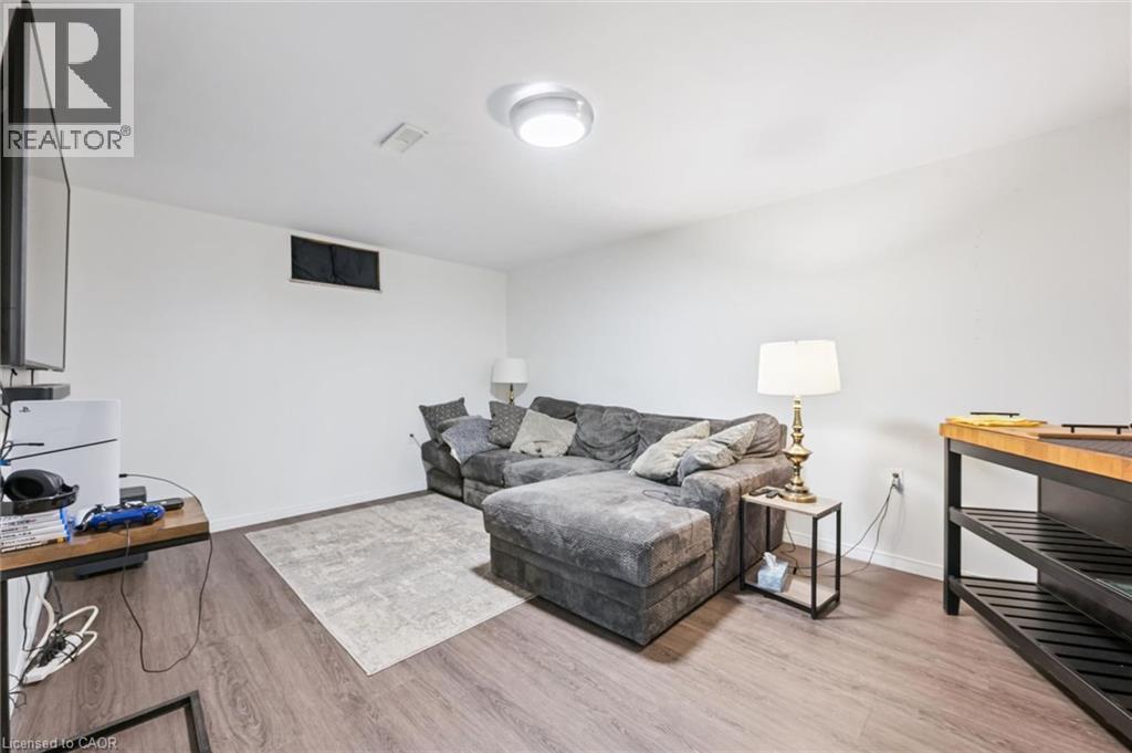 Recessed ceiling lighting, wood-finish flooring, and white painted walls - 765 Angler Way, Waterloo, ON - Indoor
