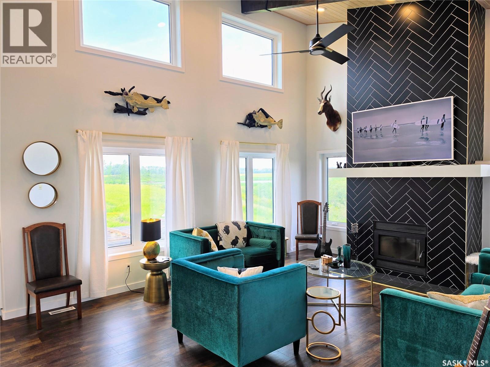 162 Lucien Lakeshore Drive, Lucien Lake, SK - Indoor Photo Showing Living Room With Fireplace