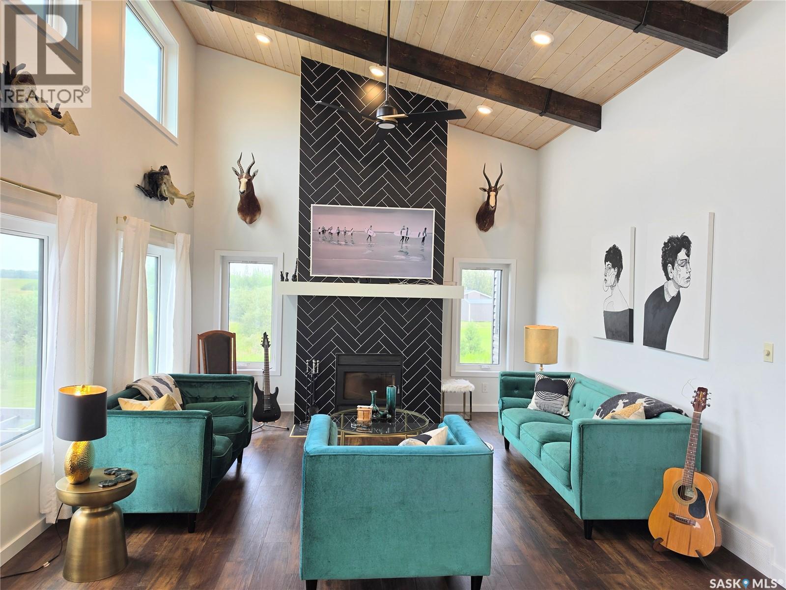 162 Lucien Lakeshore Drive, Lucien Lake, SK - Indoor Photo Showing Living Room With Fireplace