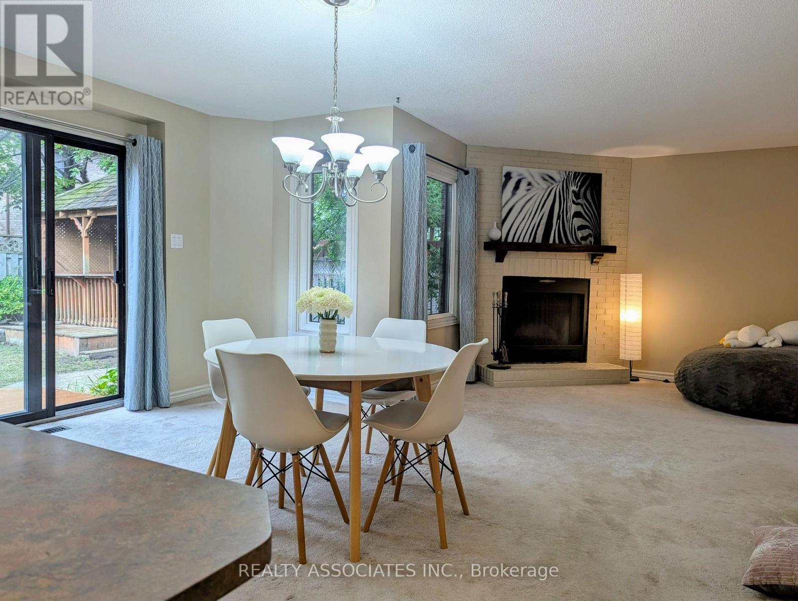 3279 Charlebrook Court, Mississauga, ON - Indoor Photo Showing Dining Room With Fireplace
