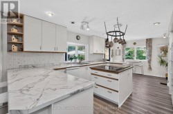 Kitchen sink overlooking the green space - 