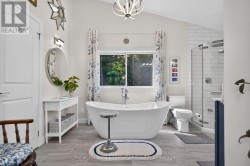 Updated Spa Bathroom (Primary Bedroom) - 