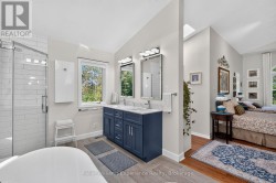 Updated Spa Bathroom (Primary Bedroom) - 