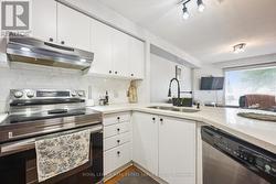 Kitchen Features Quartz Counters & S/S Appliances - 