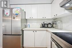 Kitchen Features Quartz Counters & S/S Appliances - 