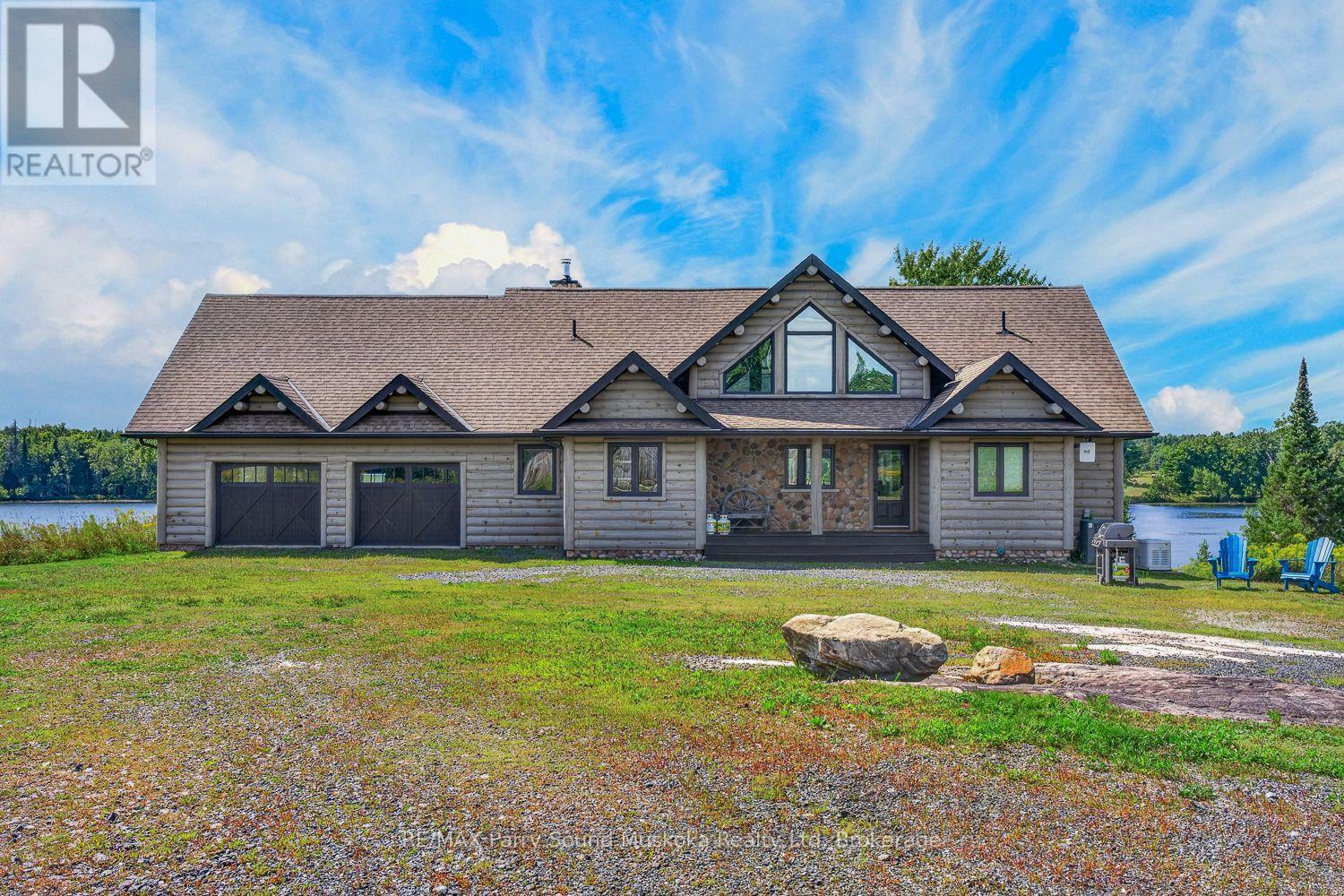 64 Mccords Road, Mckellar, ON - Outdoor With Facade