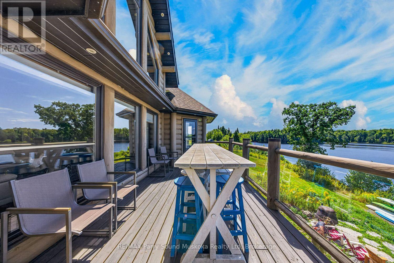 64 Mccords Road, Mckellar, ON - Outdoor With Body Of Water With Deck Patio Veranda