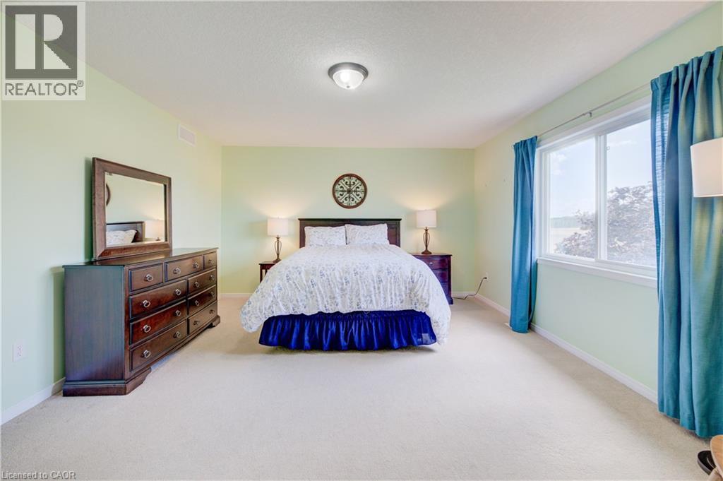 Light green wall paint - 64 Kropf Drive, Baden, ON - Indoor Photo Showing Bedroom
