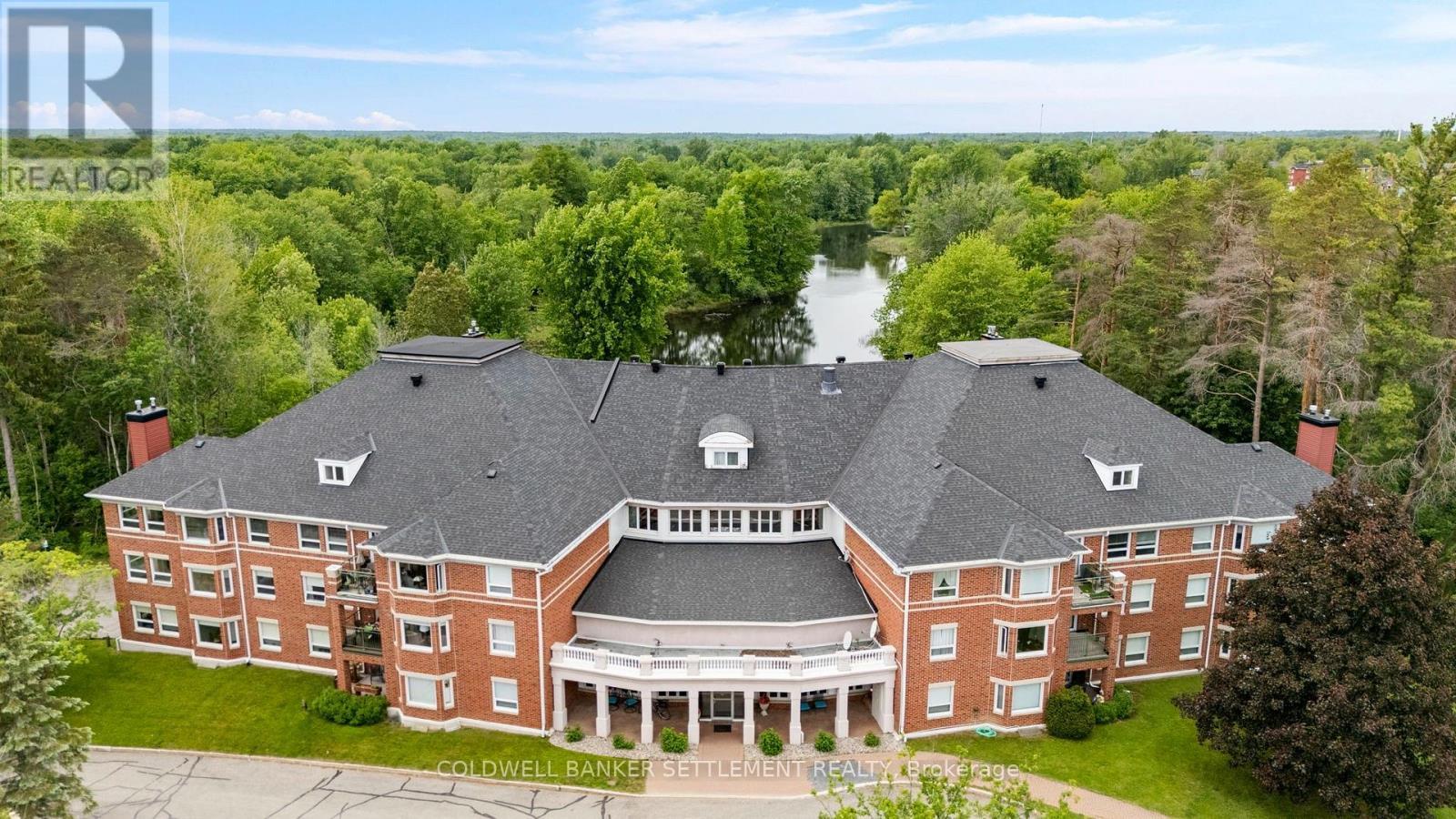 Welcome to Huntingdon Green in historic Perth. - 207 - 23 Rogers Road, Perth, ON - Outdoor With Deck Patio Veranda
