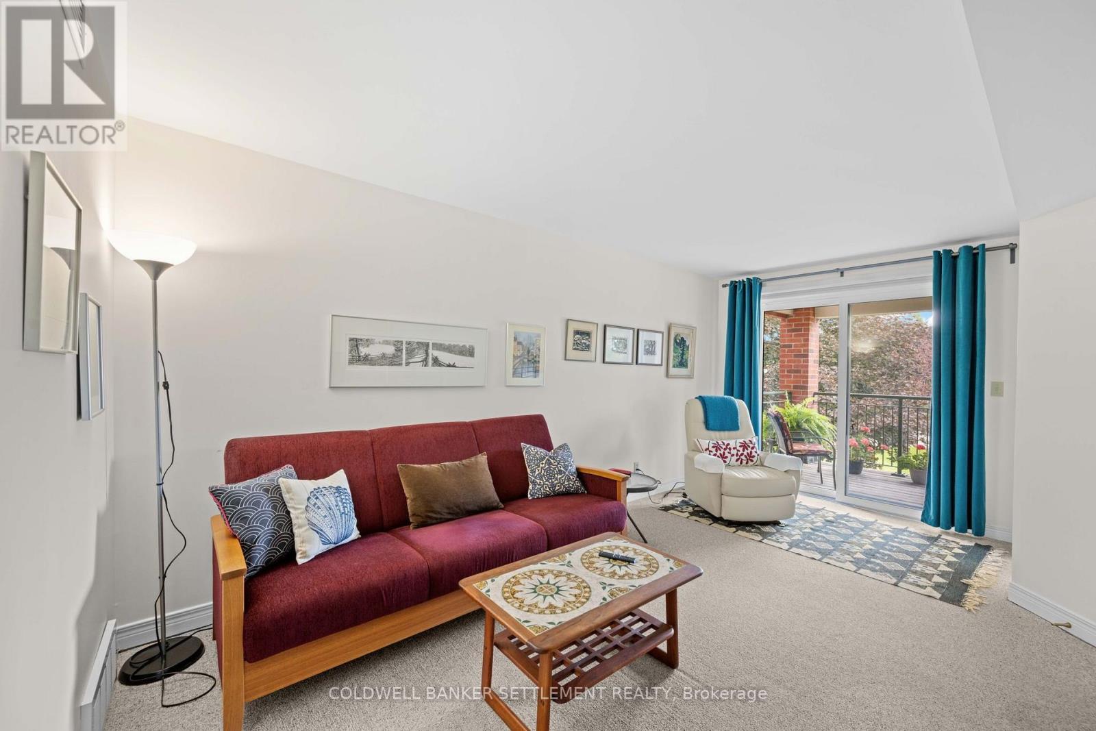 Door to balcony - 207 - 23 Rogers Road, Perth, ON - Indoor Photo Showing Living Room