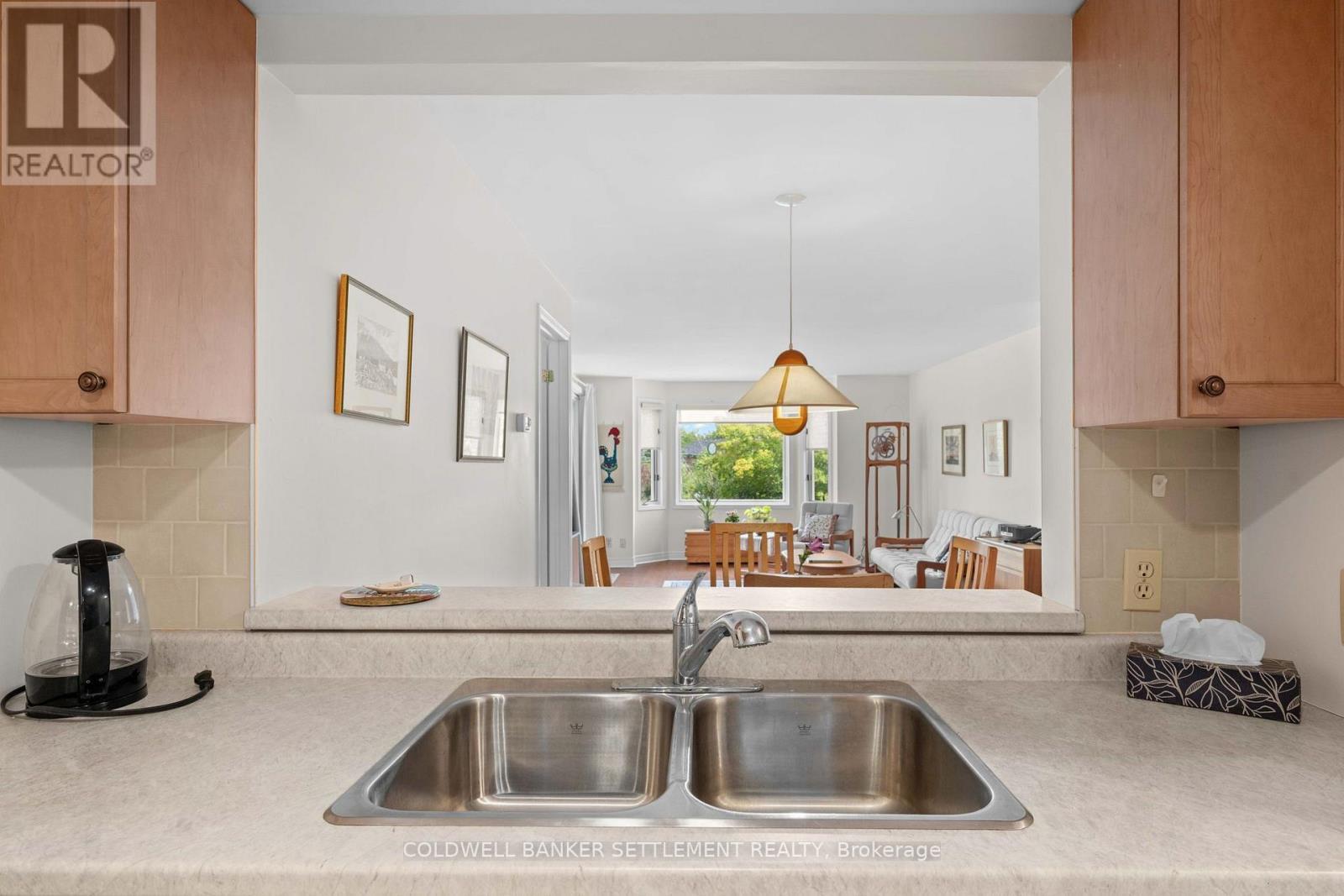 207 - 23 Rogers Road, Perth, ON - Indoor Photo Showing Kitchen With Double Sink