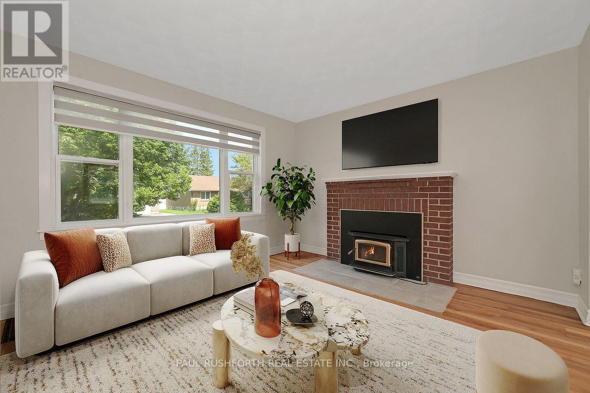 Virtually Staged-Living Room - 1072 Richard Avenue, Ottawa, ON - Indoor Photo Showing Living Room With Fireplace