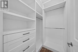 Walk-in Closet with custom Built-ins - 