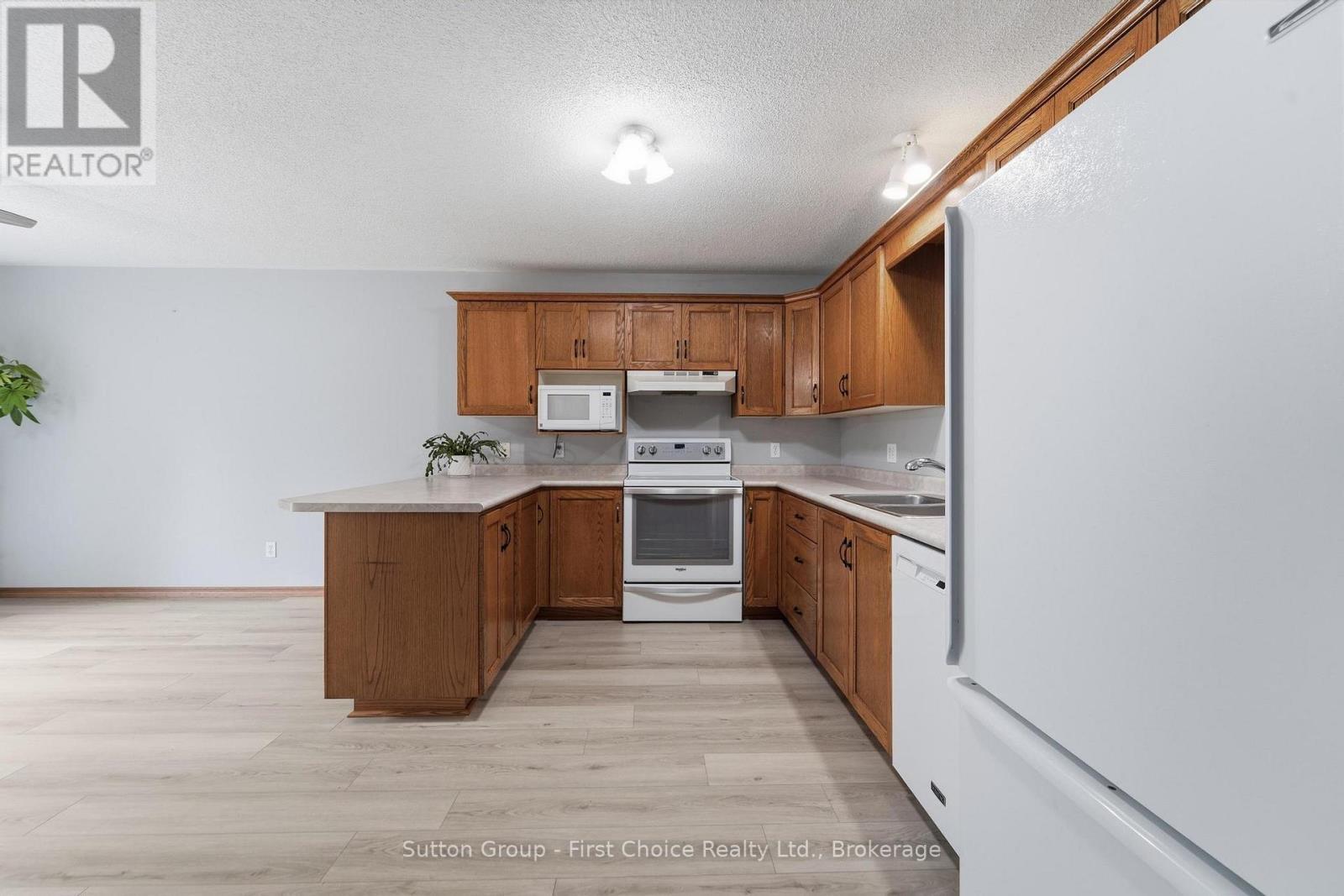 56 Huron Road, West Perth (Mitchell), ON - Indoor Photo Showing Kitchen With Double Sink