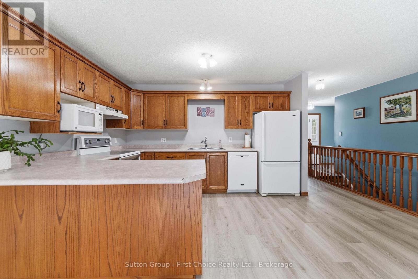 56 Huron Road, West Perth (Mitchell), ON - Indoor Photo Showing Kitchen With Double Sink