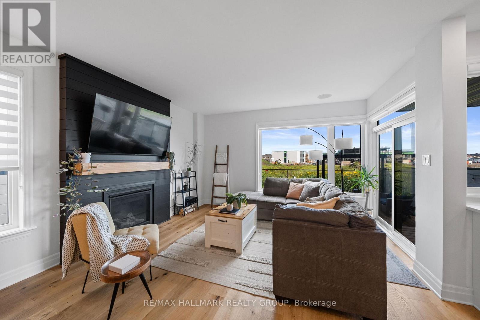 917 Atrium Ridge, Ottawa, ON - Indoor Photo Showing Living Room With Fireplace