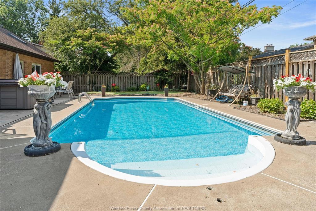 3740 Ouellette, Windsor, ON - Outdoor With In Ground Pool With Backyard