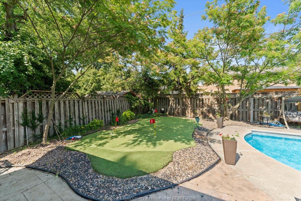 3740 Ouellette, Windsor, ON - Outdoor With In Ground Pool With Backyard