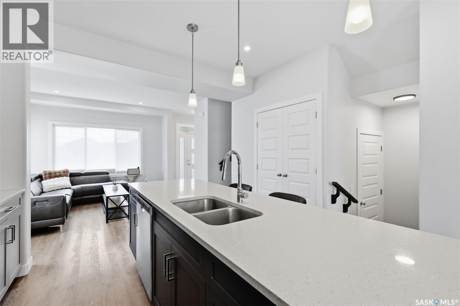122 Taskamanwa Street, Saskatoon, SK - Indoor Photo Showing Kitchen With Double Sink With Upgraded Kitchen