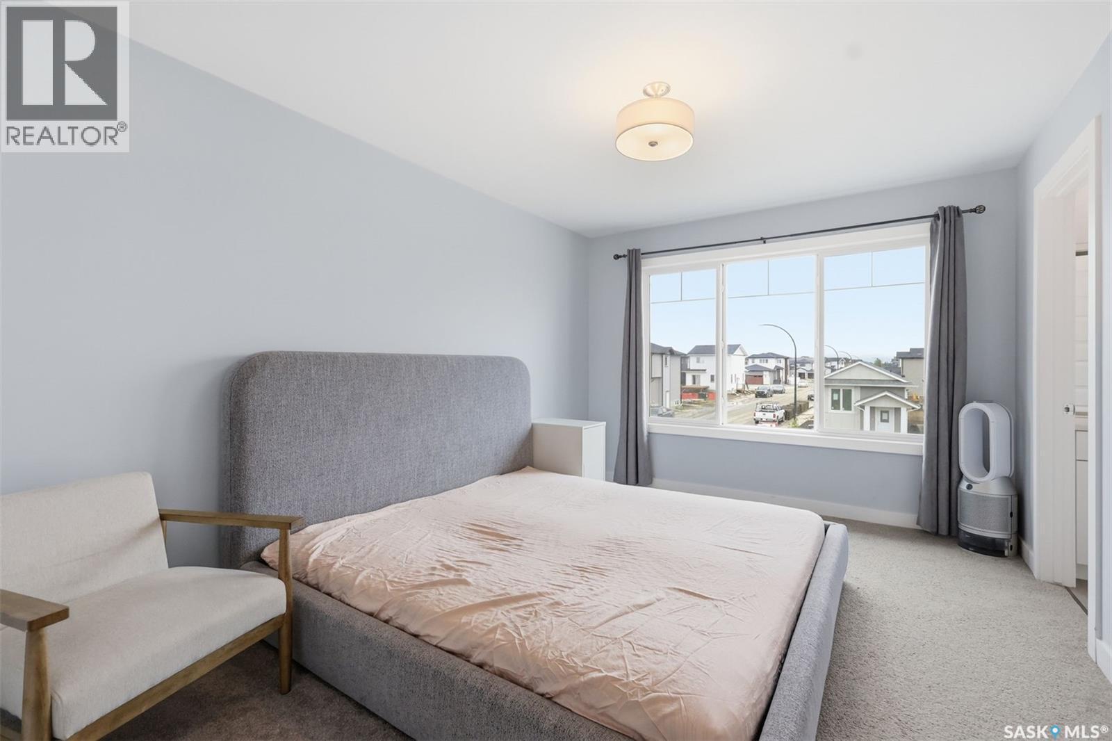 122 Taskamanwa Street, Saskatoon, SK - Indoor Photo Showing Bedroom