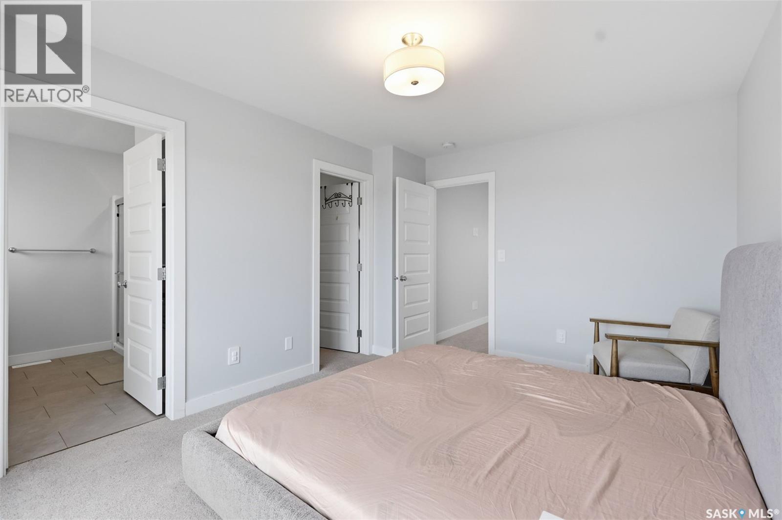 122 Taskamanwa Street, Saskatoon, SK - Indoor Photo Showing Bedroom