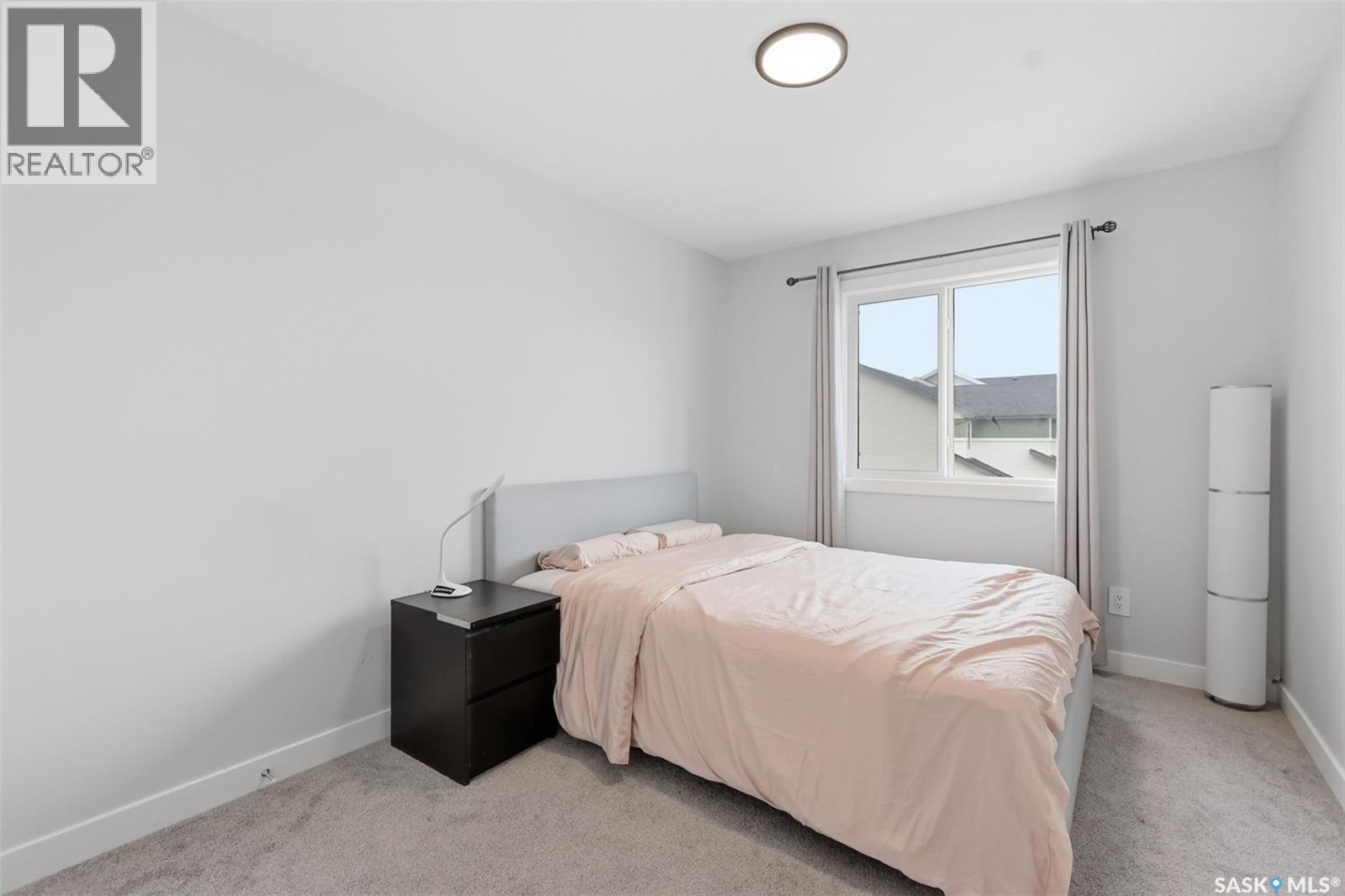 122 Taskamanwa Street, Saskatoon, SK - Indoor Photo Showing Bedroom