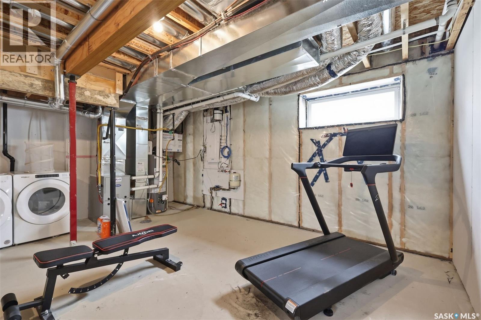 122 Taskamanwa Street, Saskatoon, SK - Indoor Photo Showing Gym Room