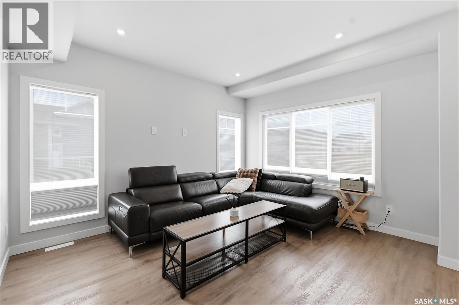 122 Taskamanwa Street, Saskatoon, SK - Indoor Photo Showing Living Room