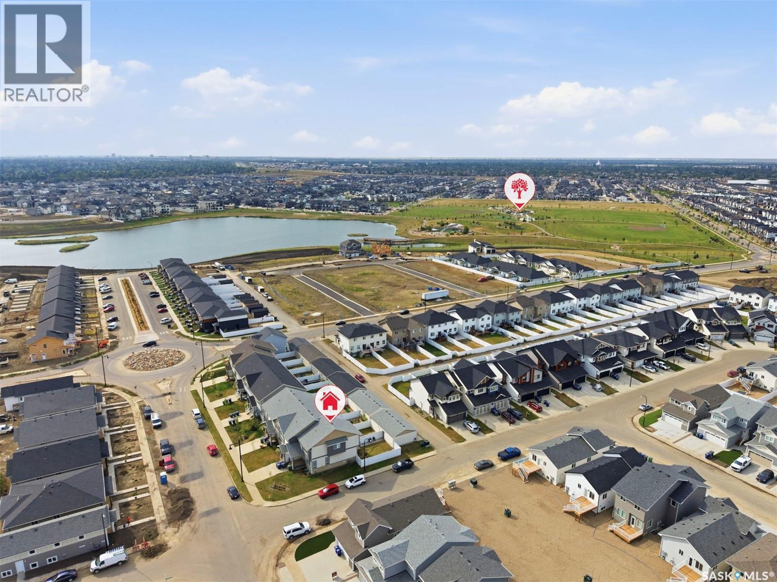 122 Taskamanwa Street, Saskatoon, SK - Outdoor With Body Of Water With View