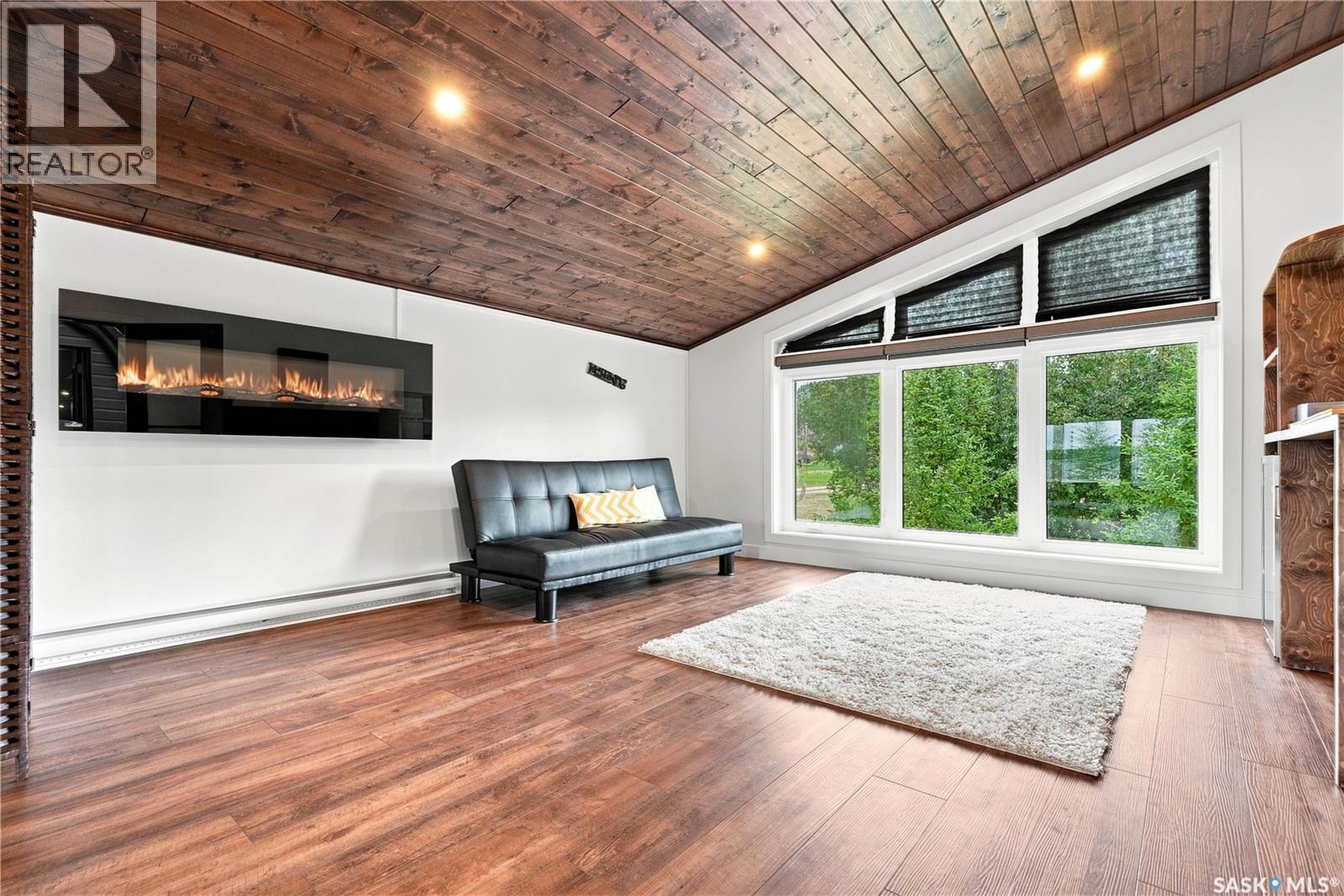 5000 Lakeside Road, Marean Lake, SK - Indoor With Fireplace