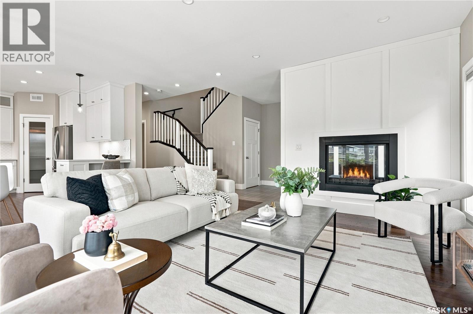 232 Secord Way, Saskatoon, SK - Indoor Photo Showing Living Room With Fireplace