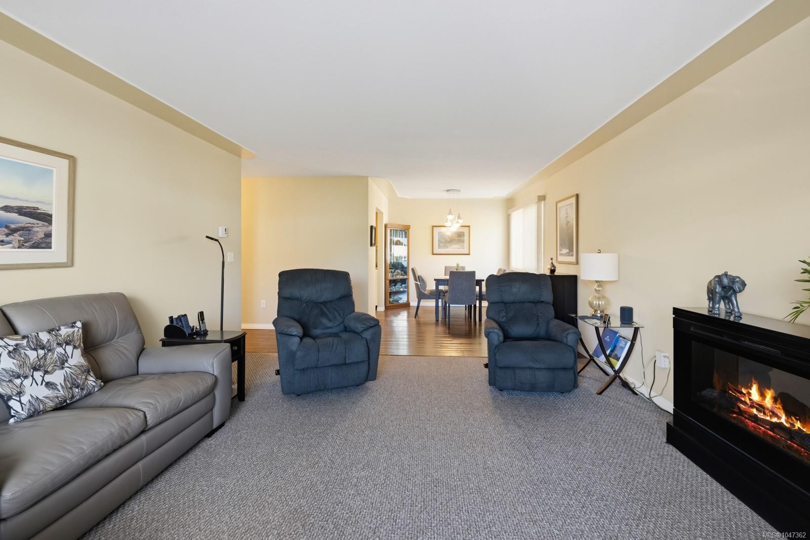 #307-254 First St, Duncan, BC - Indoor Photo Showing Living Room With Fireplace