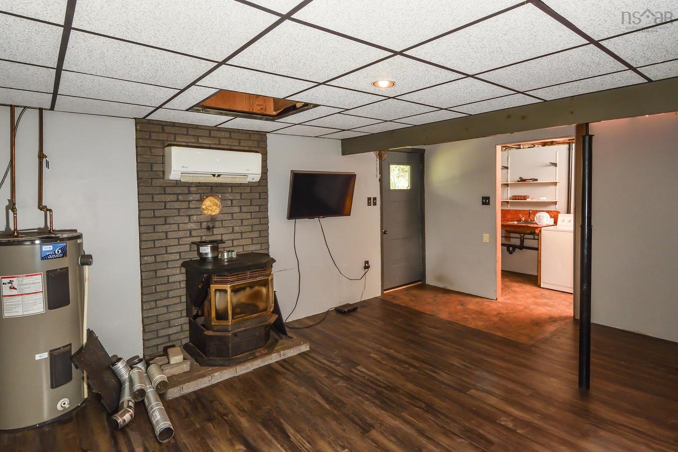 27 Riverview Drive, Bridgewater, NS - Indoor Photo Showing Other Room With Fireplace